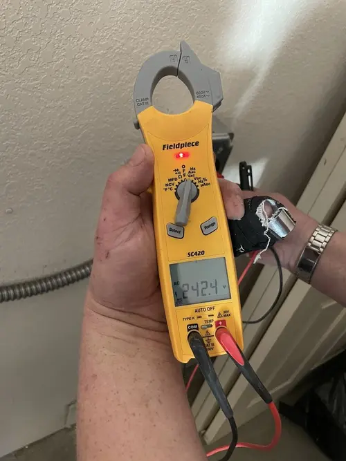 Voltage testing with clamp meter during Whole House Surge Protector in Hammonton